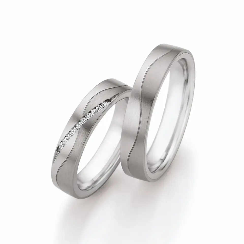 Alianzas de boda de acero y titanio con diamantes