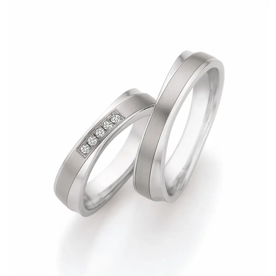 Alianzas de boda de acero y titanio con diamantes