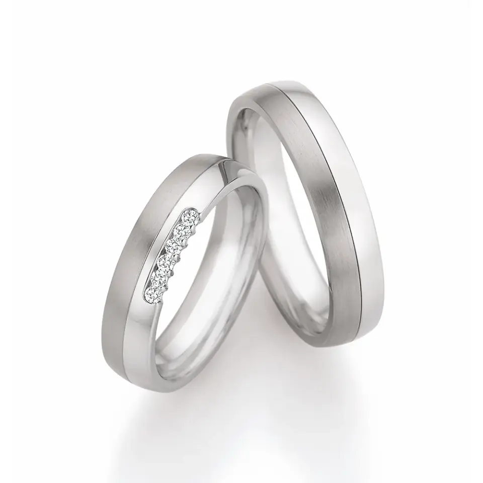 Alianzas de boda de acero y titanio con diamantes