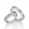 Alianzas de boda de acero y titanio con diamantes