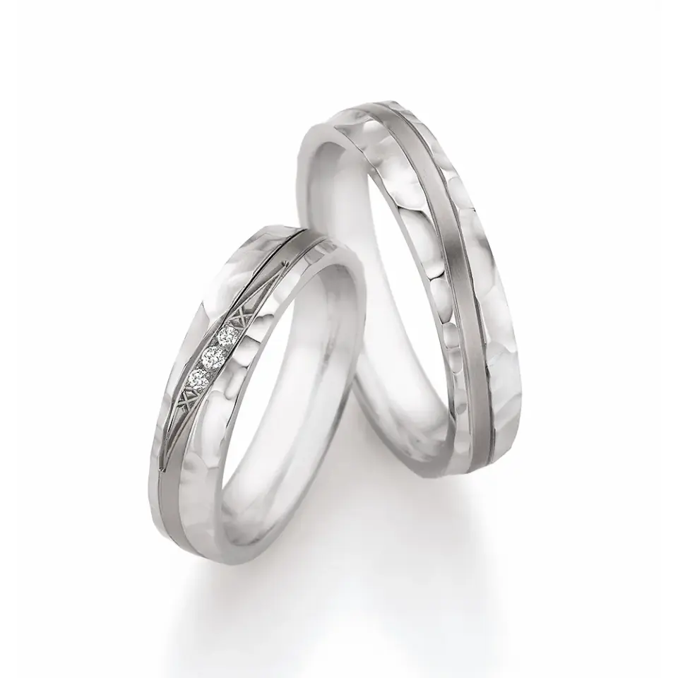 Alianzas de boda de acero y titanio con diamantes