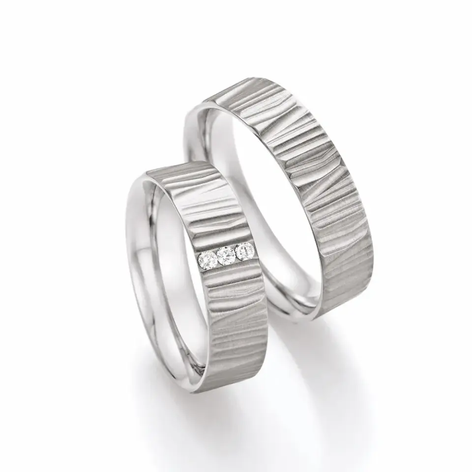 Alianzas de boda de titanio con diamantes