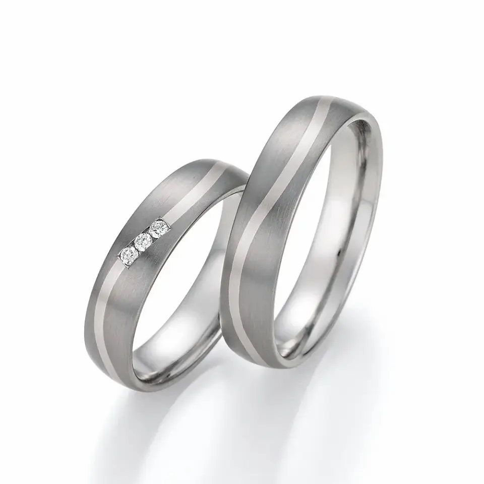 Alianzas de boda de titanio y oro blanco con diamantes