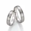 Alianzas de boda de titanio y oro blanco con diamantes