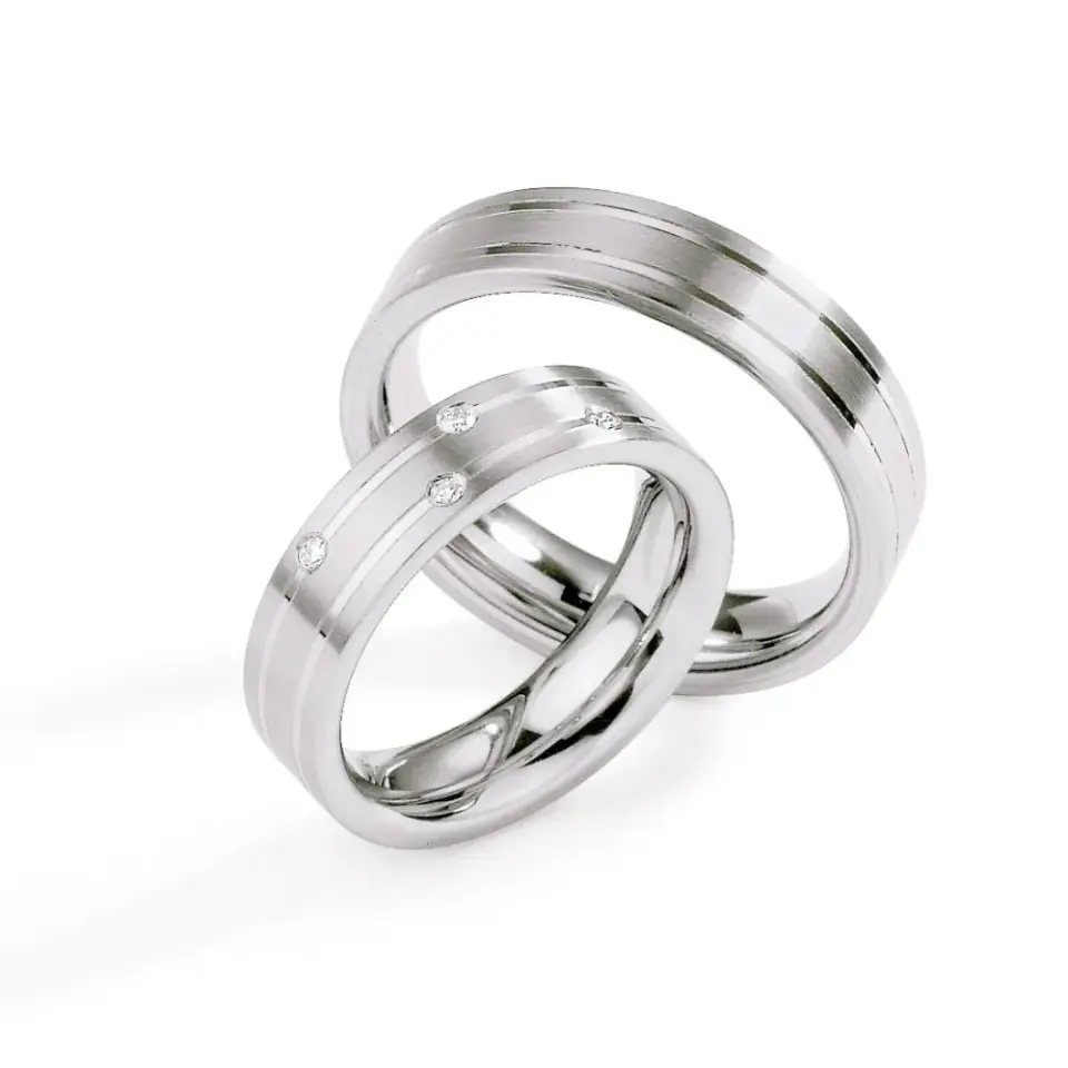 Alianzas de boda de acero con diamante