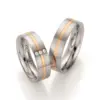 Alianzas de boda de acero y oro rosado con diamantes
