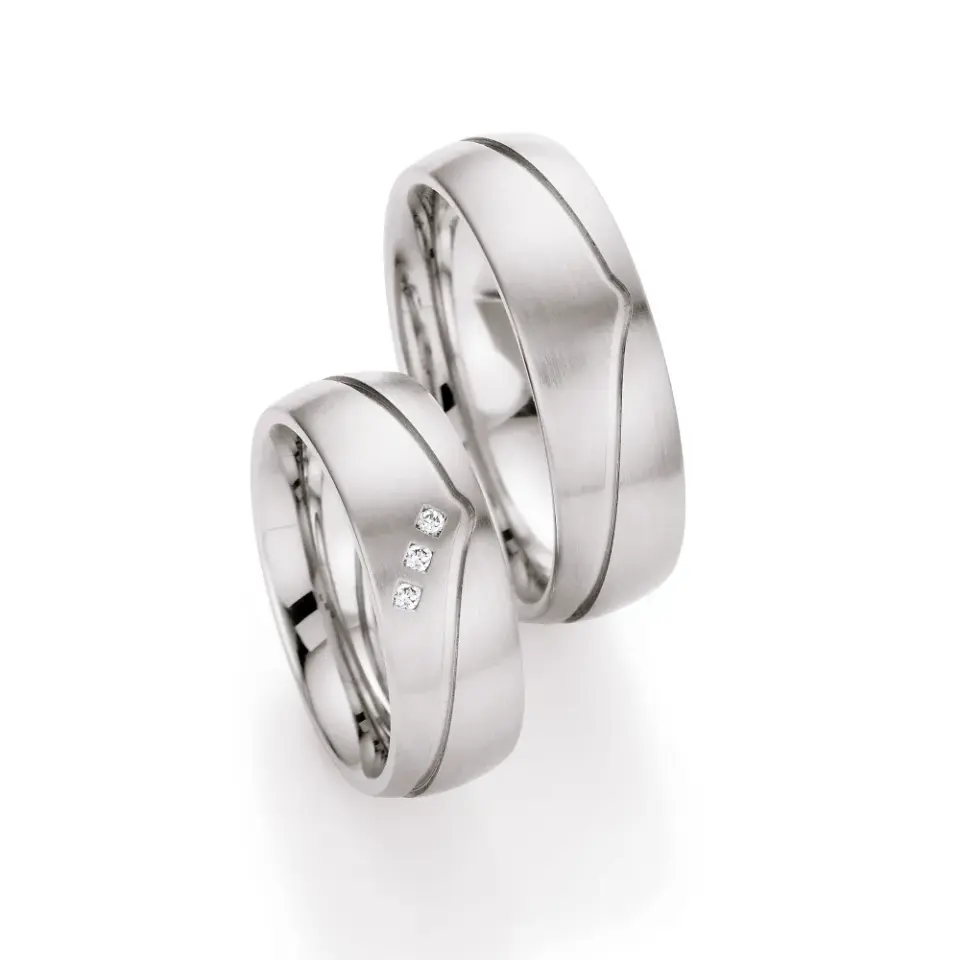 Alianzas de boda de acero con diamantes