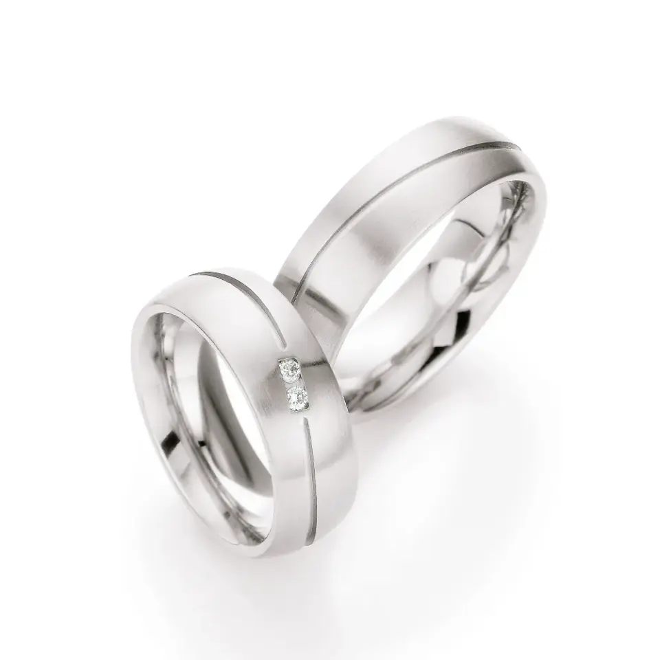 Alianzas de boda de acero con diamante
