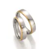 Alianzas de boda de acero y oro amarillo con diamante