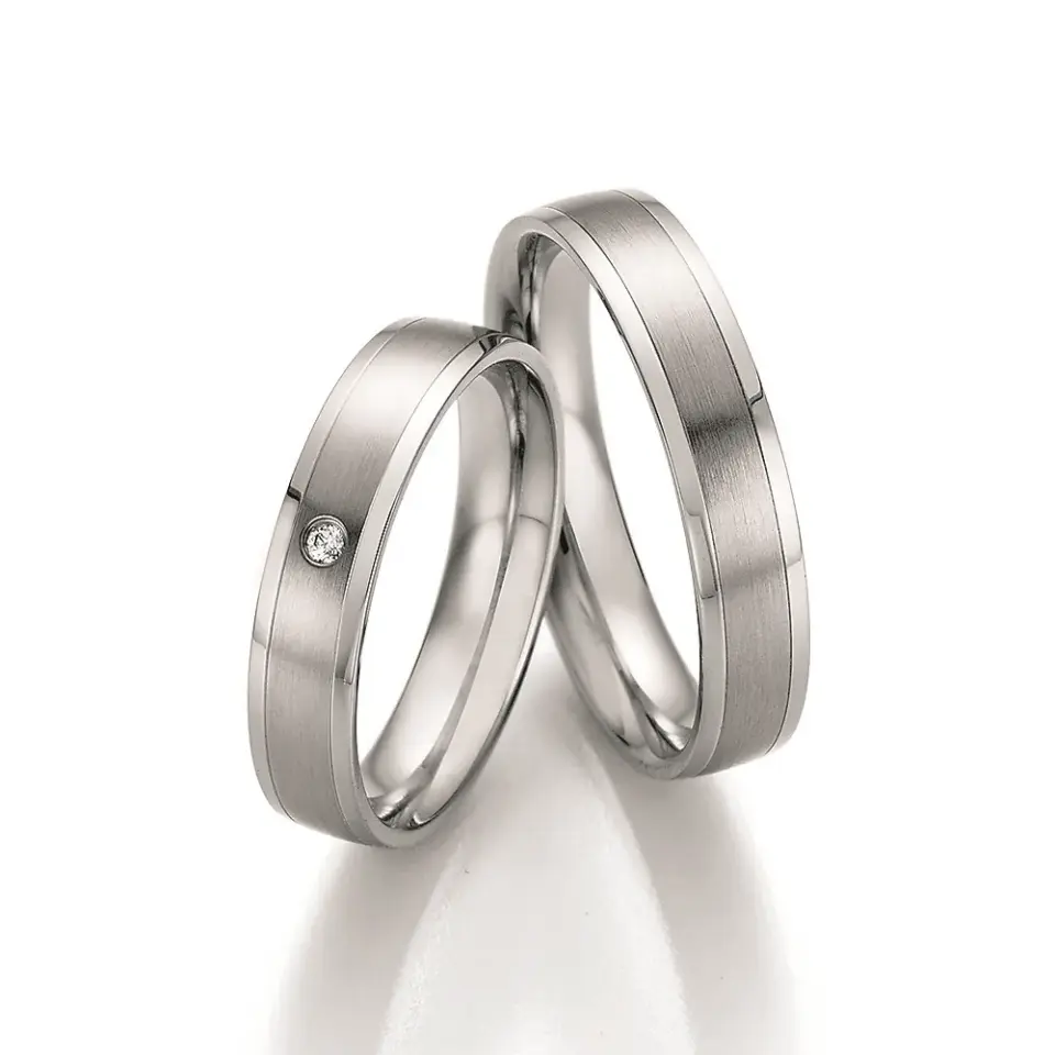 Alianzas de boda de acero con diamante