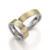 Alianzas de boda de acero y oro amarillo con diamantes