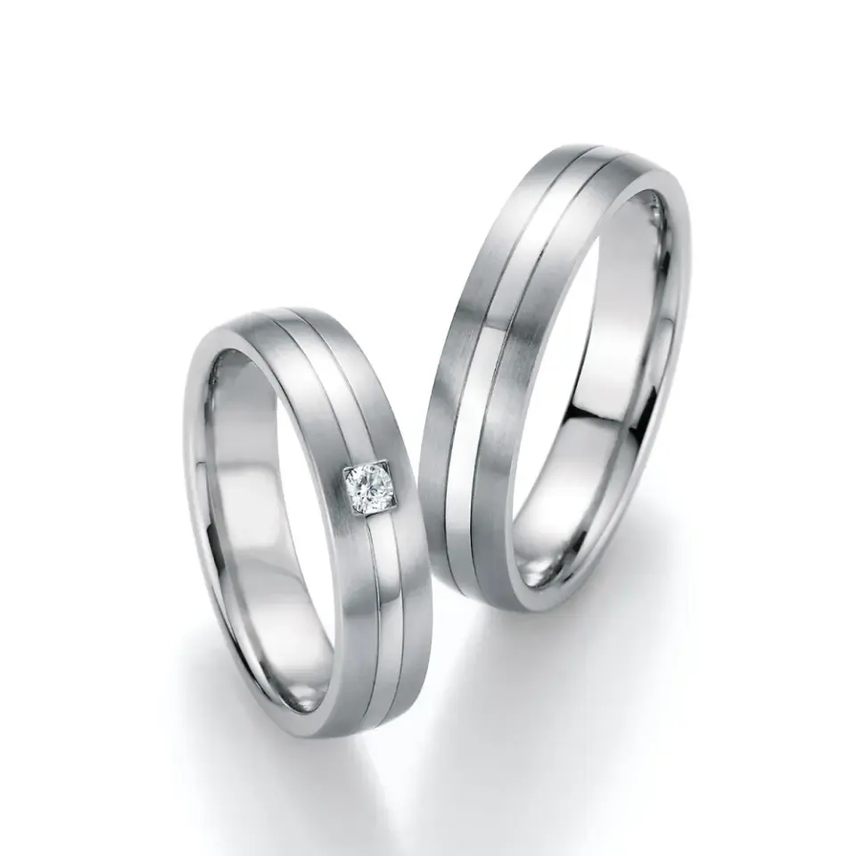Alianzas de boda de acero con diamante