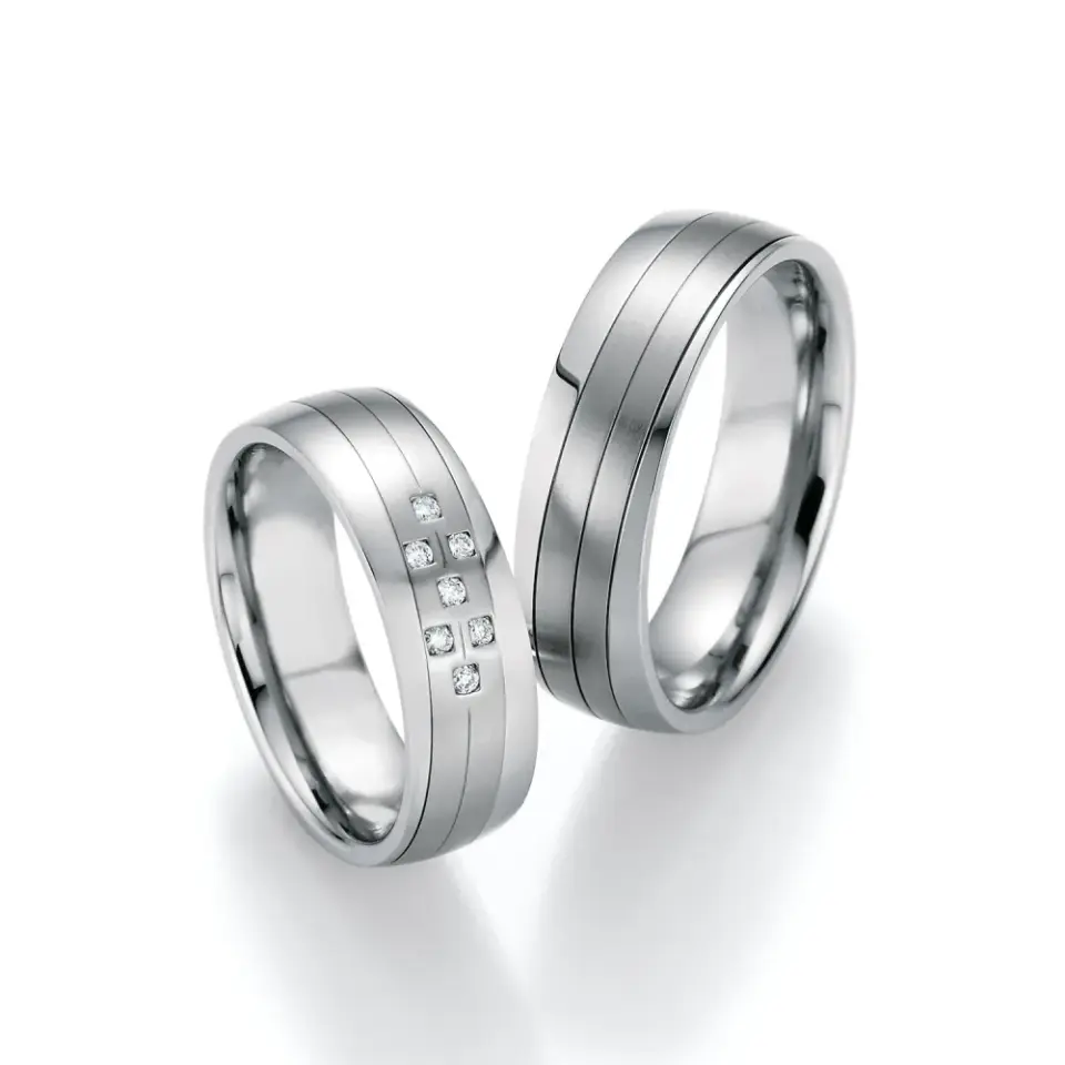 Alianzas de boda de acero con diamantes