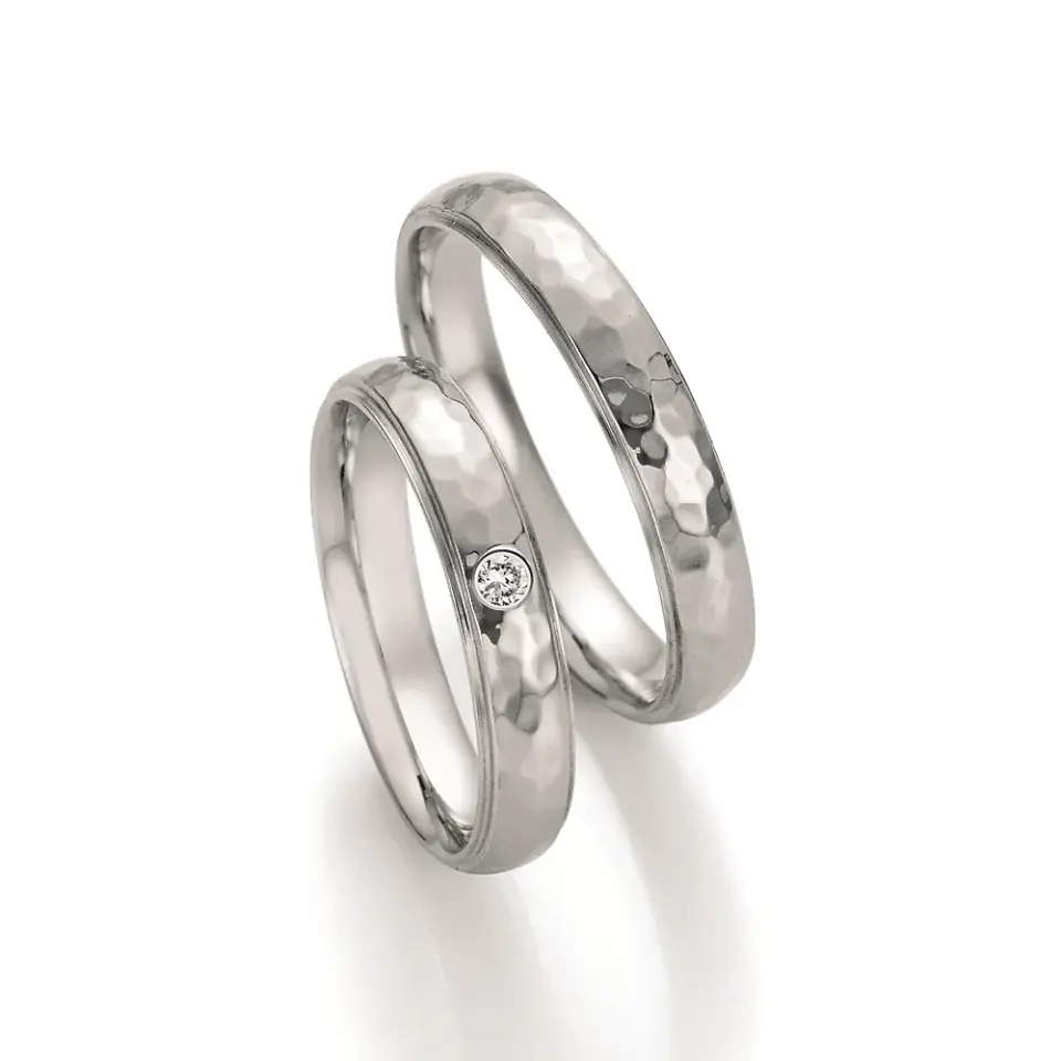 Alianzas de boda de acero con diamante