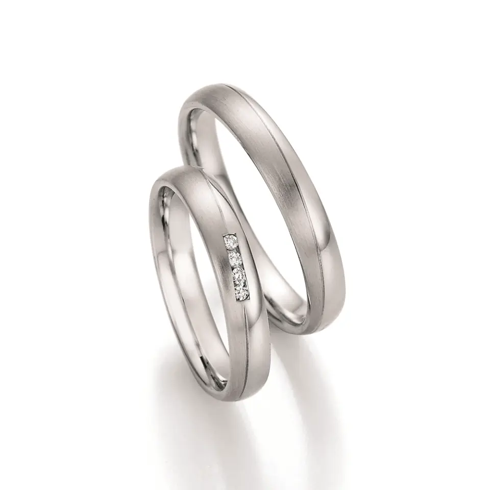 Alianzas de boda de acero con diamantes