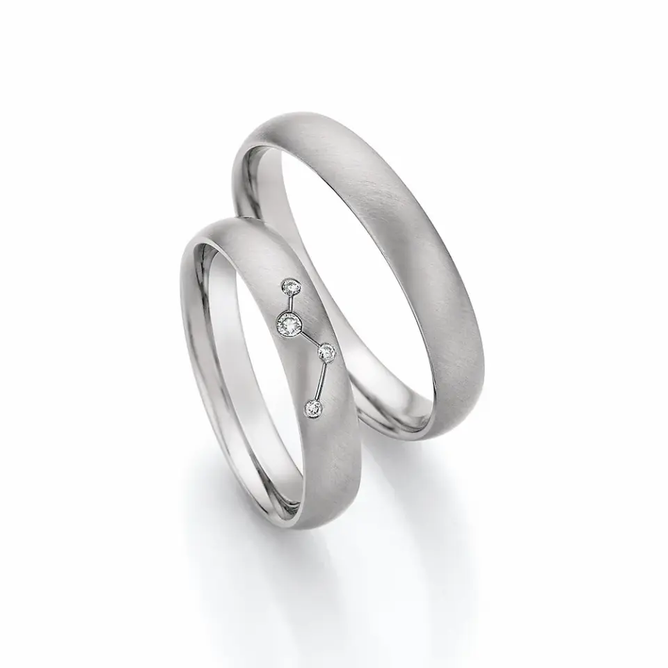 Alianzas de boda de acero con diamantes