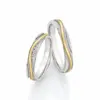 Alianzas de boda de acero y oro amarillo con diamantes