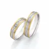 Alianzas de boda de acero y oro amarillo con diamante