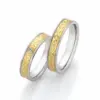 Alianzas de boda de acero y oro amarillo con diamante