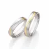 Alianzas de boda de acero y oro amarillo con diamantes