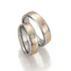 Alianzas de boda de acero y oro amarillo con diamante
