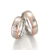 Alianzas de boda de acero y oro rosado con diamantes
