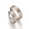 Alianzas de boda de acero y oro rosado con diamantes