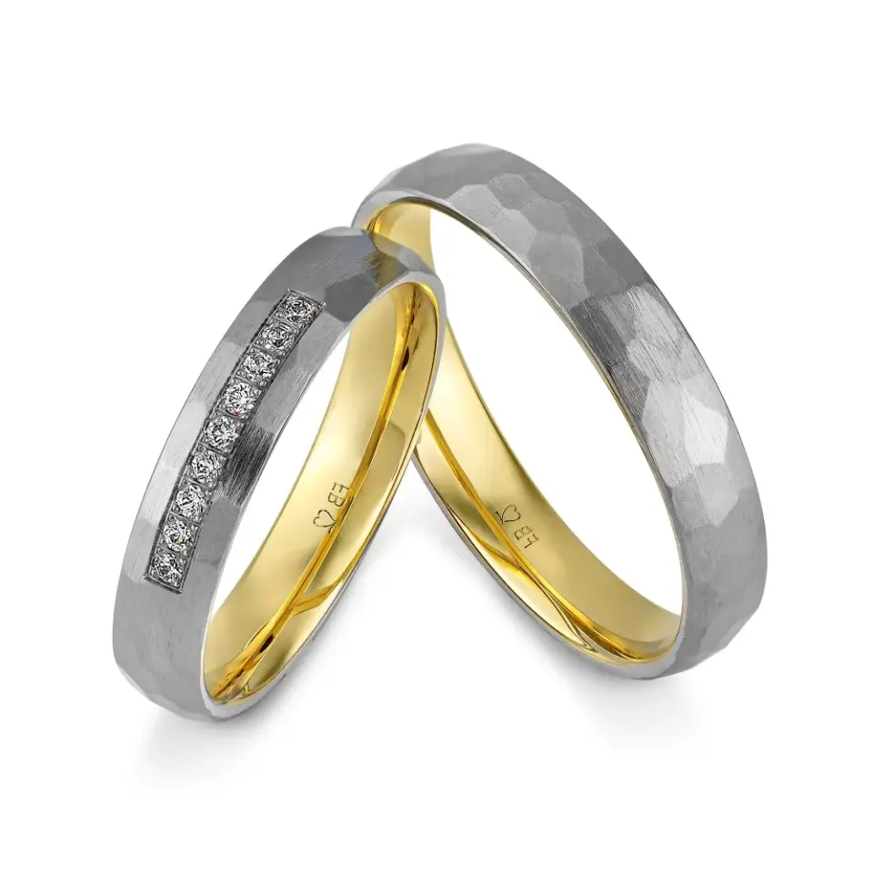 Alianzas de boda de tántalo y oro amarillo con diamantes