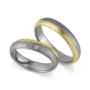 Alianzas de boda de tántalo y oro amarillo con diamantes