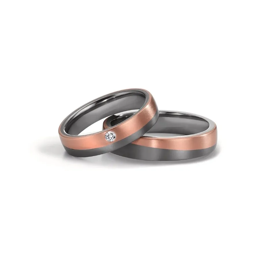 Alianzas de boda de tántalo y oro rosado con diamante