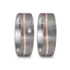 Alianzas de boda de tántalo y oro rosado con diamante
