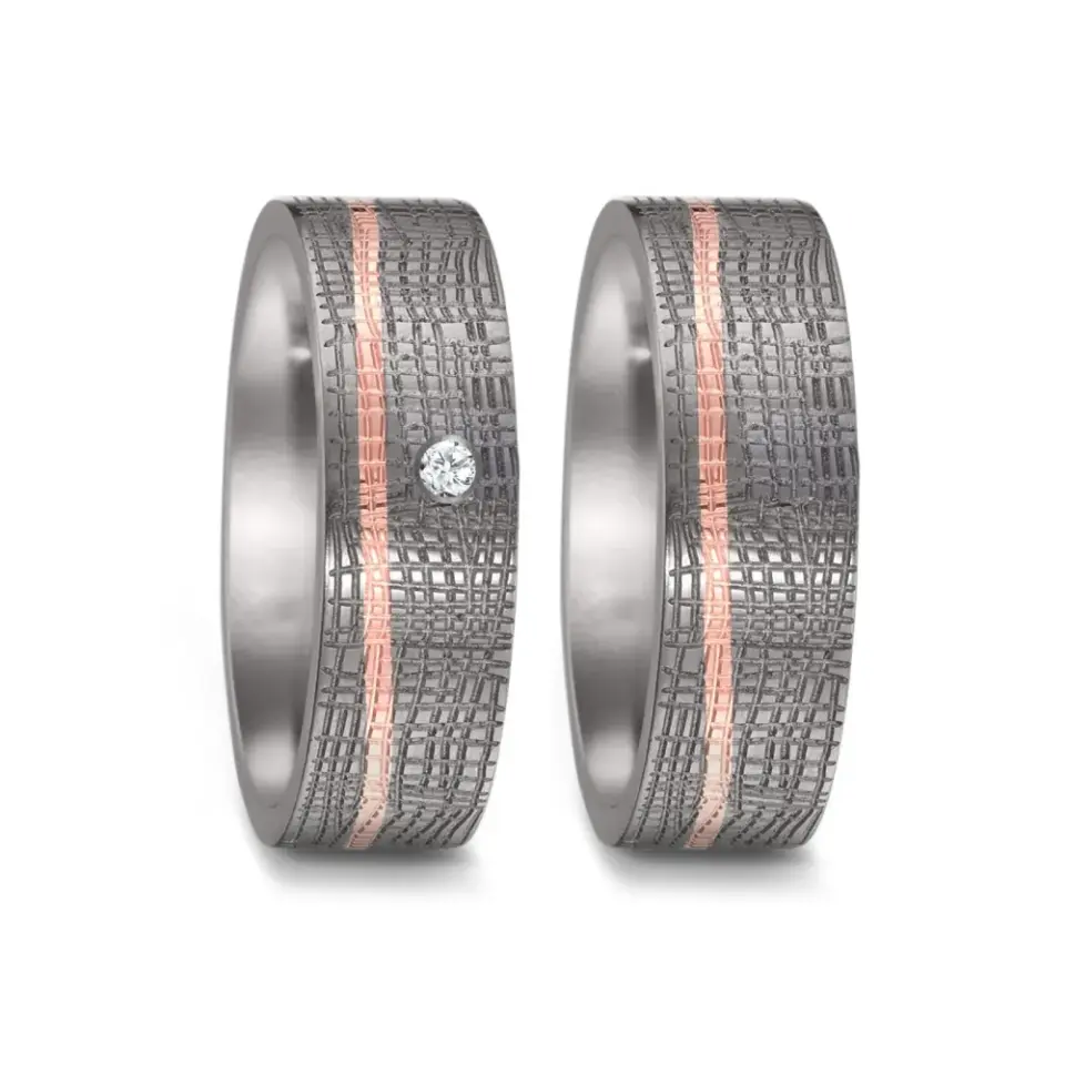 Alianzas de boda de tántalo y oro rosado con diamante