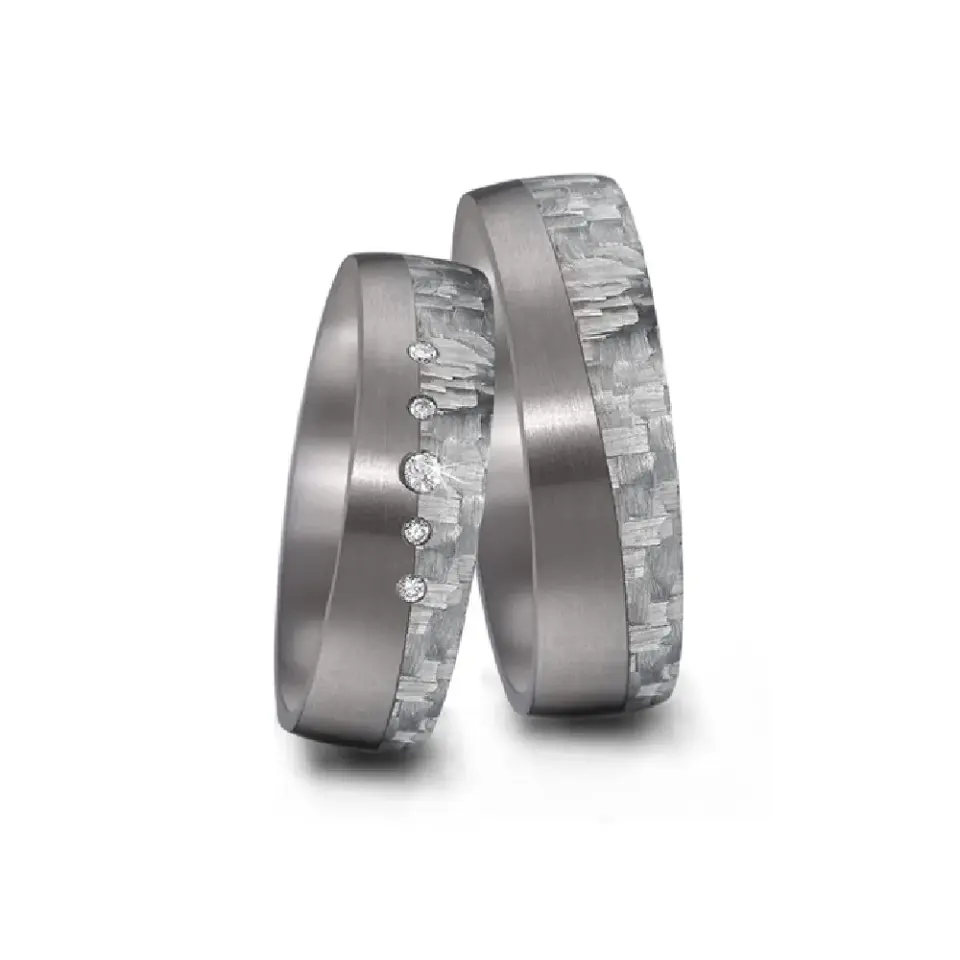 Alianzas de boda de tántalo y carbono con diamantes