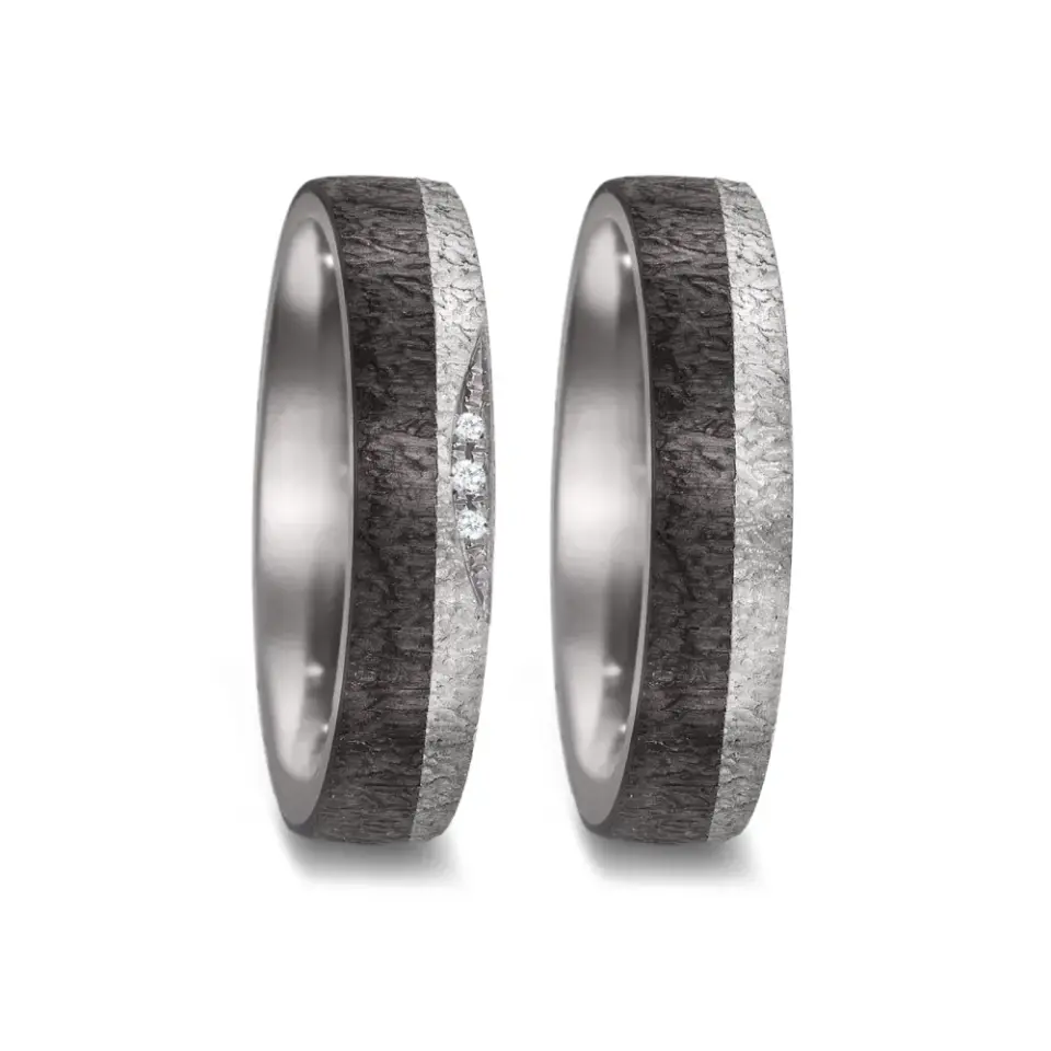 Alianzas de boda de tántalo y carbono con diamantes