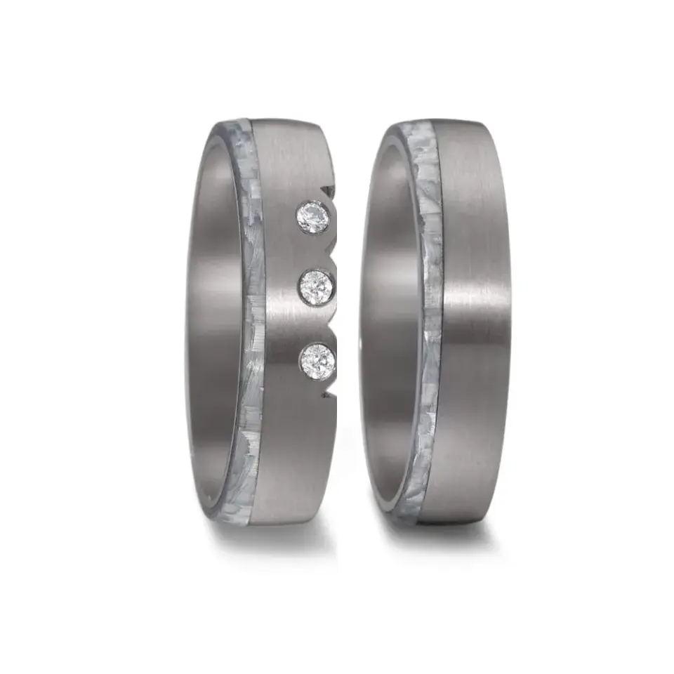 Alianzas de boda de tántalo y carbono con diamantes