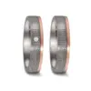 Alianzas de boda de tántalo y oro rosado con diamante