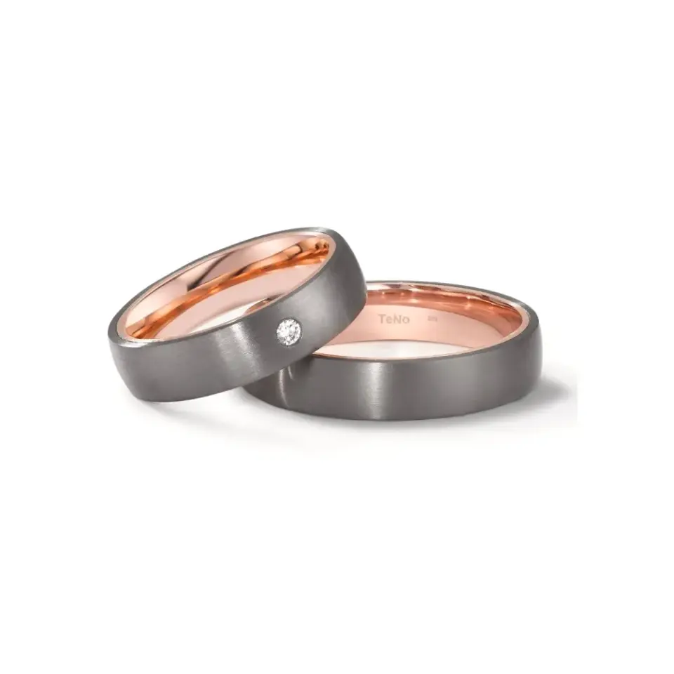 Alianzas de boda de tántalo y oro rosado con diamante