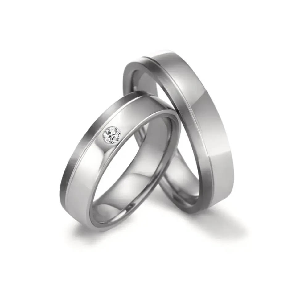 Alianzas de boda de tántalo y platino con diamante