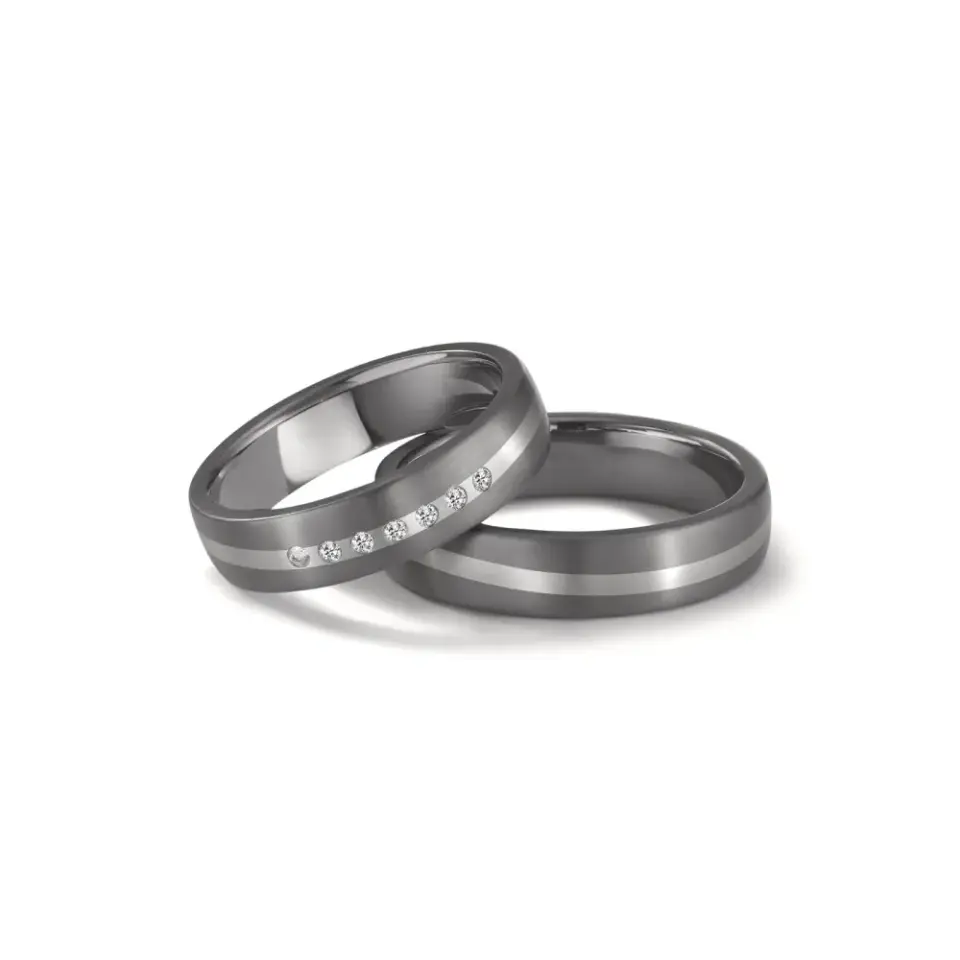 Alianzas de boda de tántalo y platino con diamantes