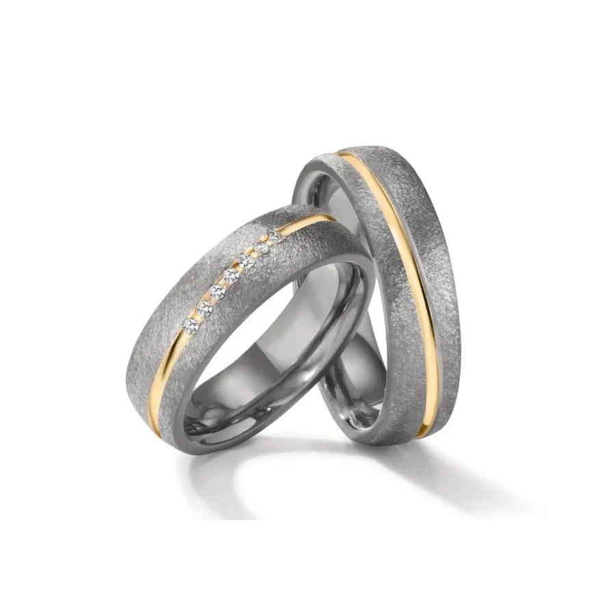 Alianzas de boda de tántalo y oro amarillo con diamantes