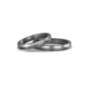 Alianzas de boda de tántalo y platino con diamantes