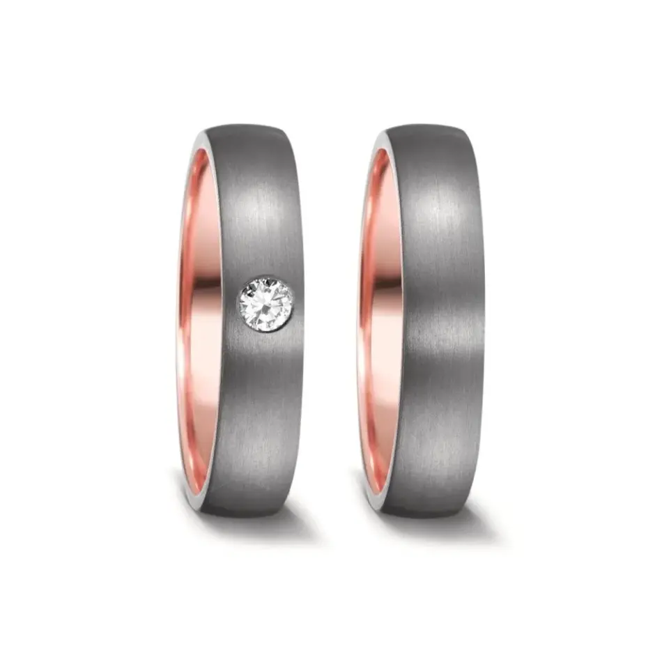 Alianzas de boda de tántalo y oro rosado con diamante