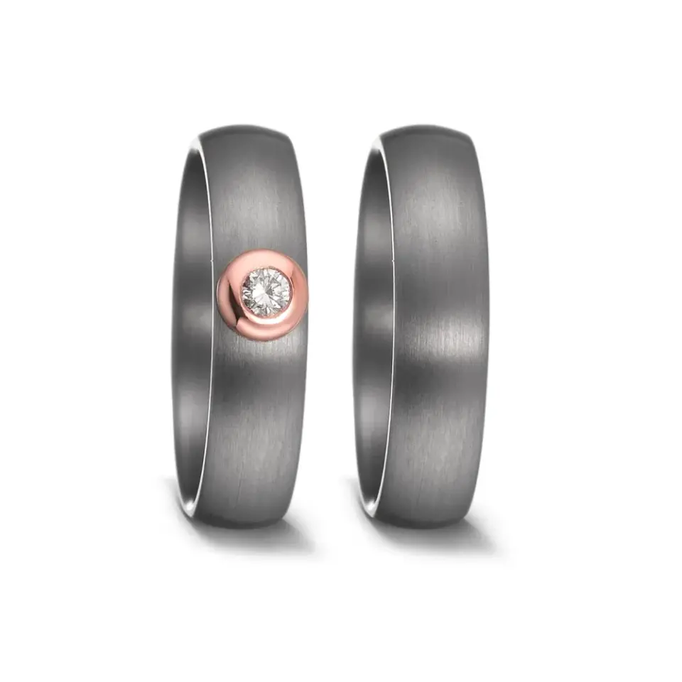 Alianzas de boda de tántalo y oro rosado con diamante