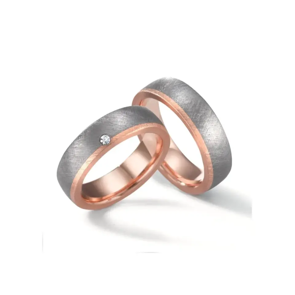 Alianzas de boda de tántalo y oro rosado con diamante