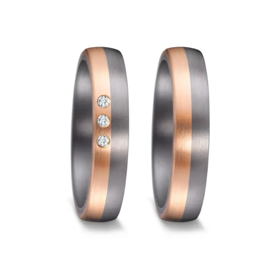 Alianzas de boda de tántalo y oro rosado con diamantes