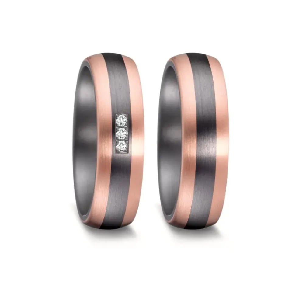 Alianzas de boda de tántalo y oro rosado con diamantes