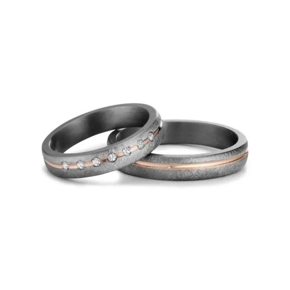 Alianzas de boda de tántalo y oro rosado con diamantes