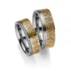 Alianzas de boda de tántalo y oro amarillo con diamantes