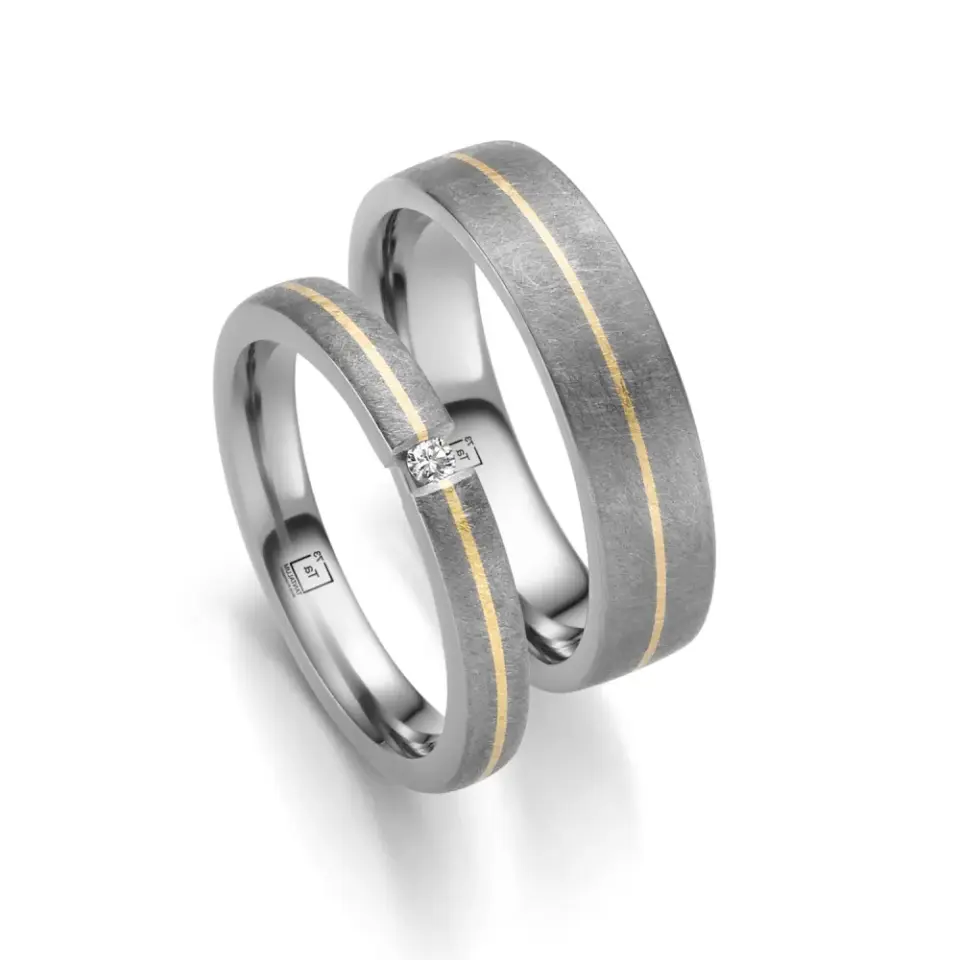 Alianzas de boda de tántalo y oro amarillo con diamante