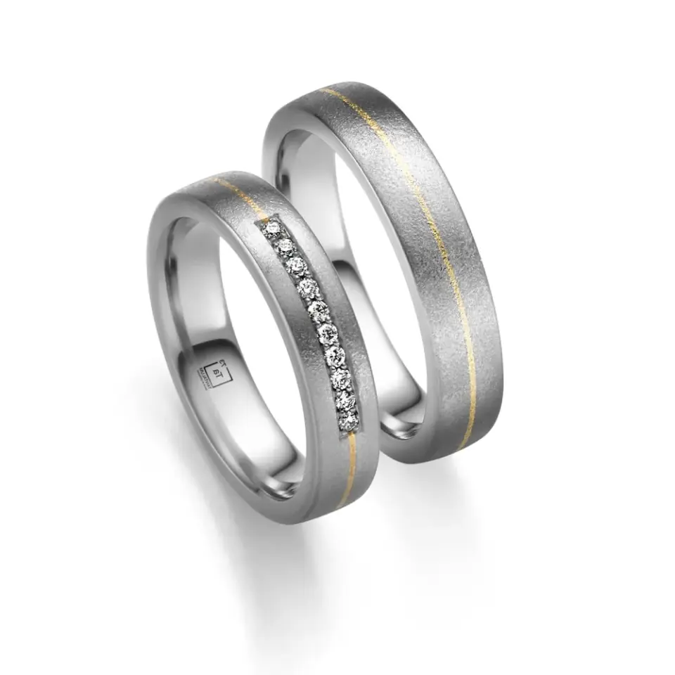 Alianzas de boda de tántalo y oro amarillo con diamantes
